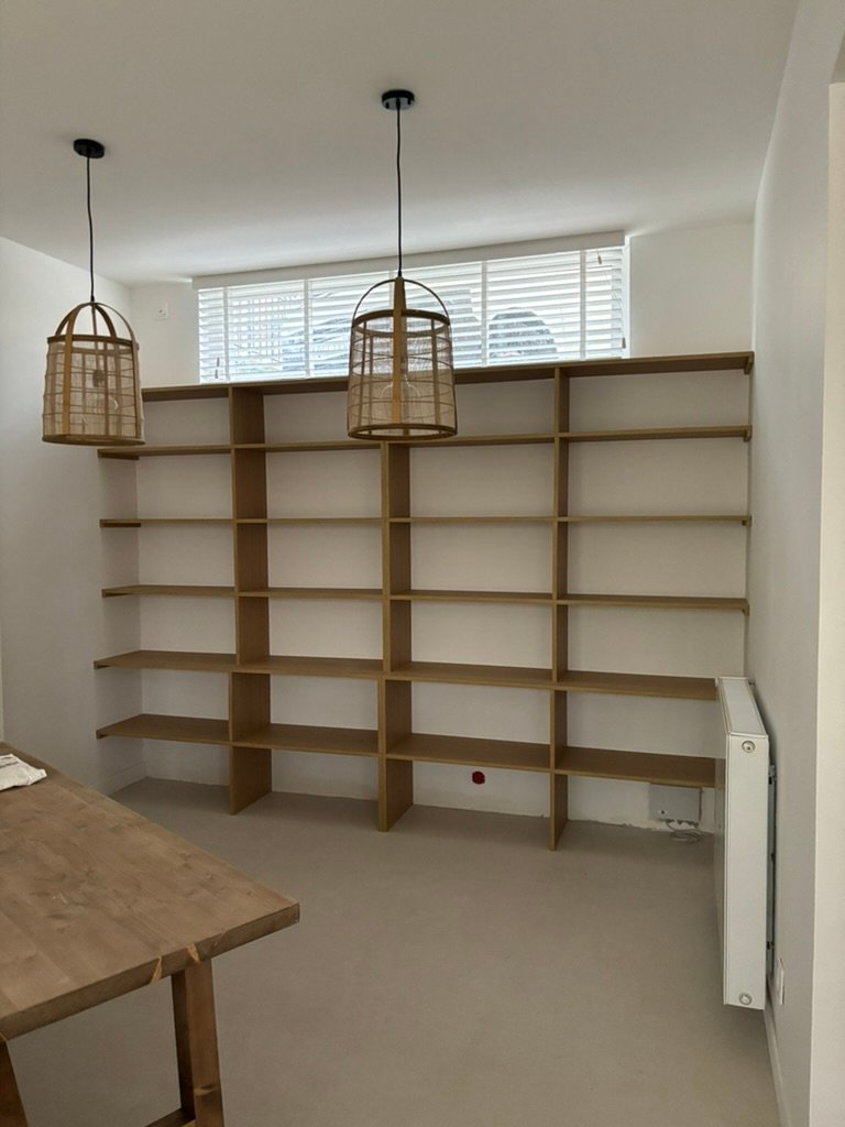 Rénovation complète — plâtrerie, cuisine et béton ciré